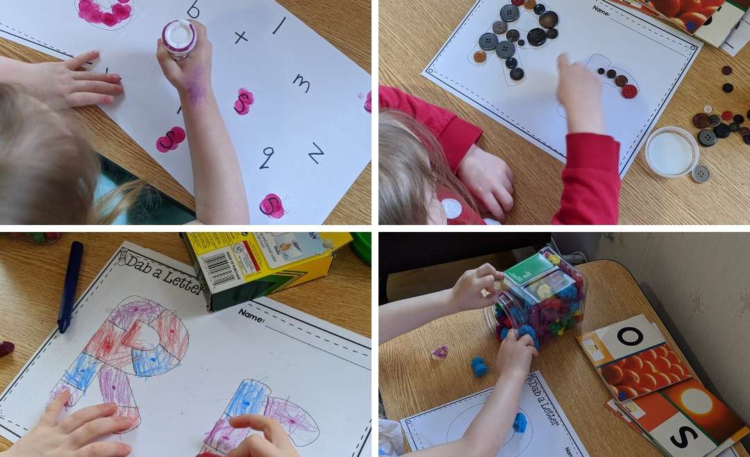 small child using various materials to make letters: bingo dabbers, buttons, crayons, and small animal counters